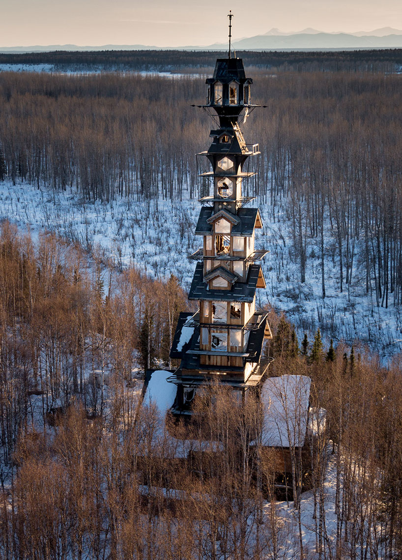 alaskan attorney builds 185 foot stacked log cabin tower in the wilderness