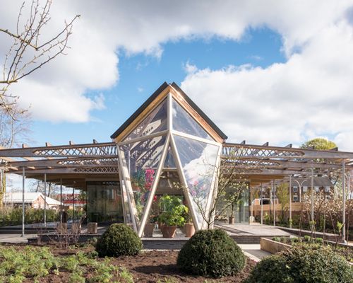 foster + partners' maggie's centre in manchester created as a garden retreat