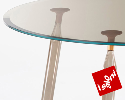 philippe starck's lady hio colored dining tables for glas italia