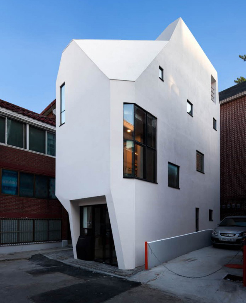 theplus architects defines seoul publisher's office with faceted white ...