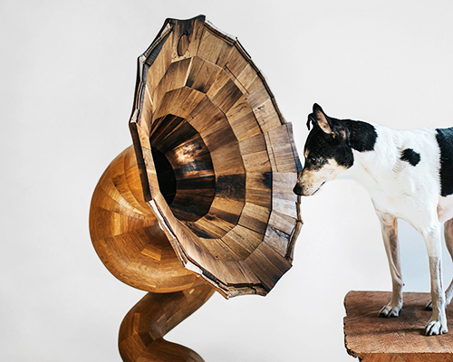 fiddle & hammer carves giant wooden horn speakers from reclaimed liquor barrels