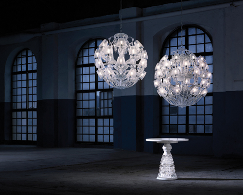 le roi soleil by marcel wanders for baccarat is adjourned with crystal shades and cut motifs