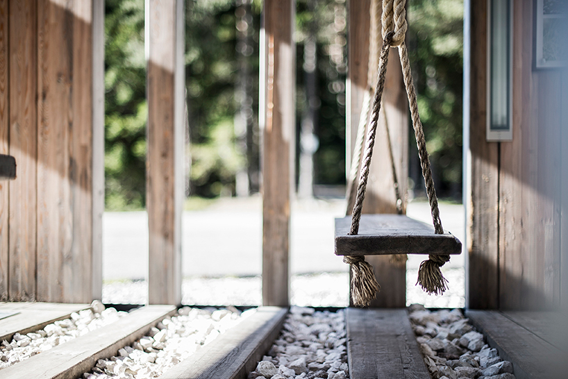 noa* builds swinging frames installation from wooden posts - 3