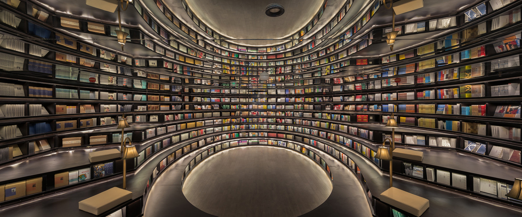 X+living's zhongshuge-hangzhou bookstore in china displays a theatrical reading area