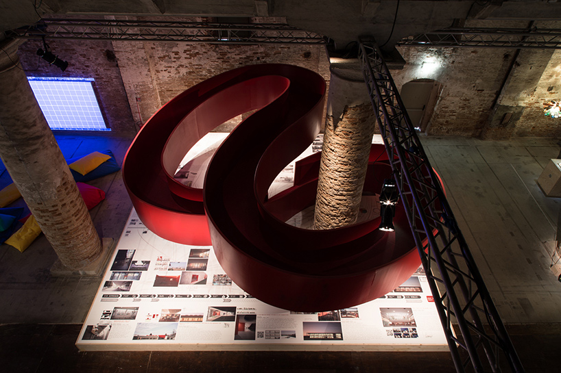 C+S-architects-suspended-red-walkway-eduCARE-venice-architecture-biennale-designboom-02