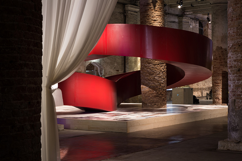 C+S-architects-suspended-red-walkway-eduCARE-venice-architecture-biennale-designboom-02