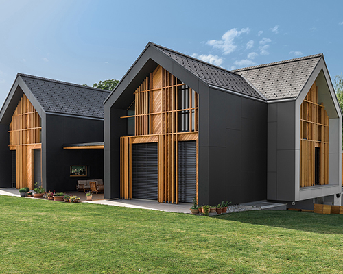 sono architects connects three gabled volumes in slovenian house
