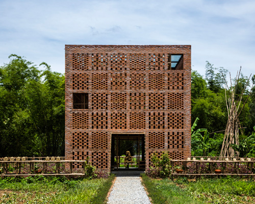 tropical space constructs pottery workshop using brick and bamboo in rural vietnam