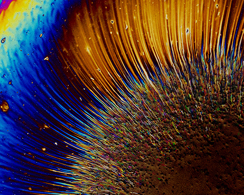 fabian oefner's iridescent oil spills form radiant color canvases