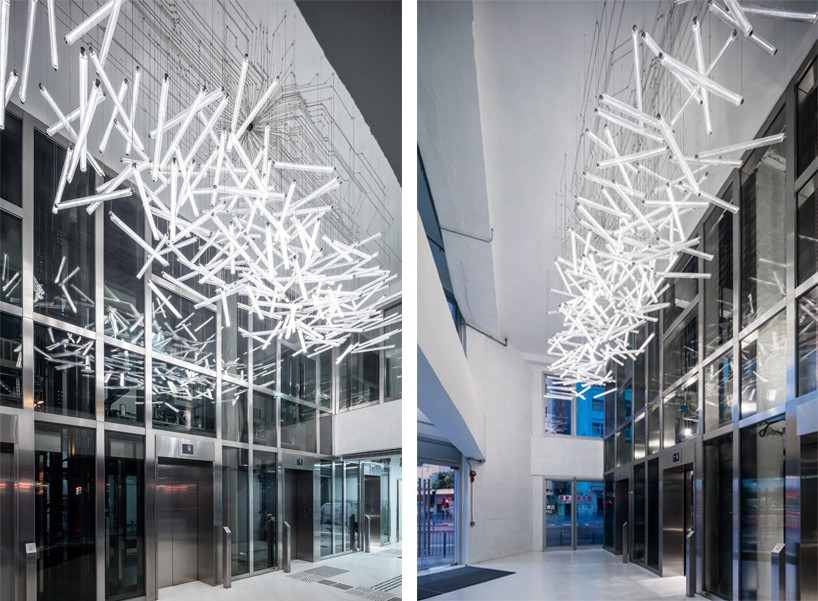 LASVIT concurrency chandelier hangs in MVRDV's hong kong glass offices