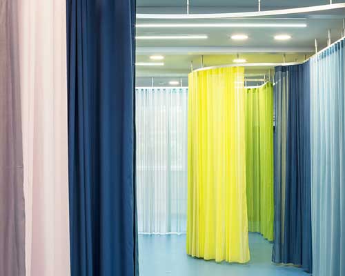 aberrant architecture reconfigures london school with sculptural rails and colored curtains