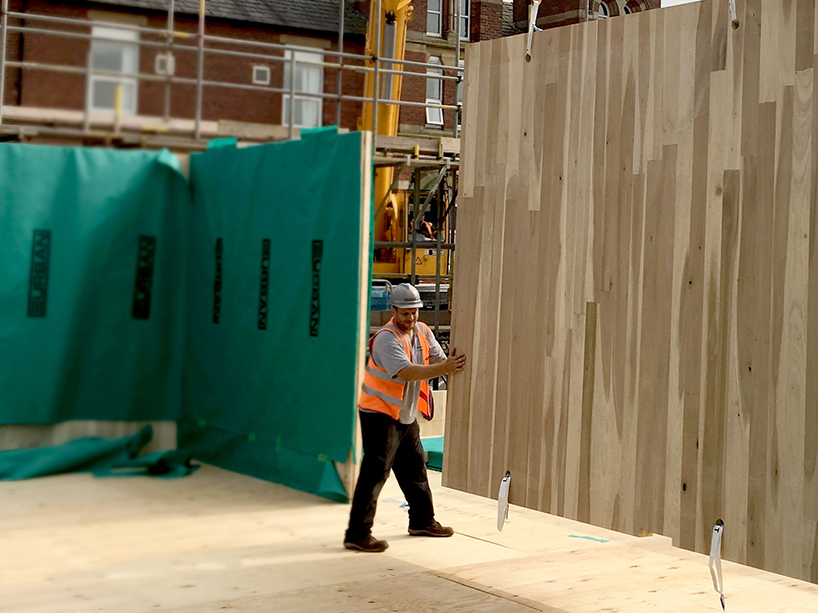 drmm-maggies-oldham-worlds-first-building-created-with-hardwood-clt-designboom-02