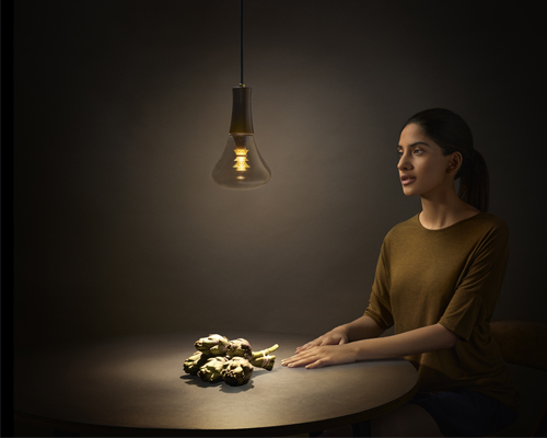 london design festival: plumen 003 lightbulb beautifies surroundings