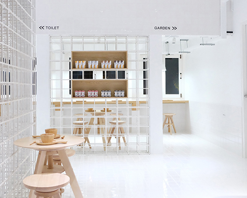thaipan studio adorns milk bar in bangkok with walls of white tile