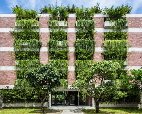 vo trong nghia drapes layer of greenery to balconies of atlas hotel vietnam