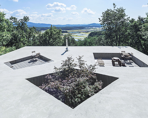 BCHO architects embeds expansive roof terrace into korean hillside