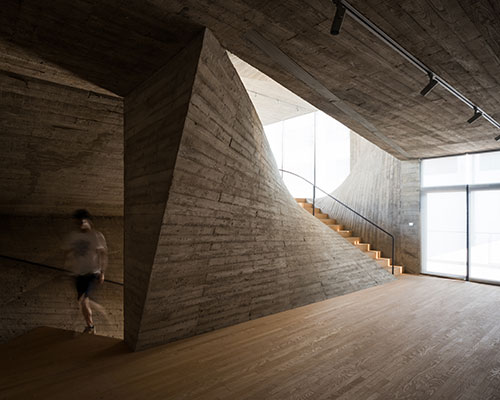 archi-union bends concrete stairwell in fab union space