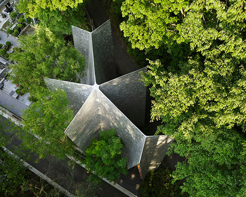 NAP architects completes aluminum-clad sayama forest chapel