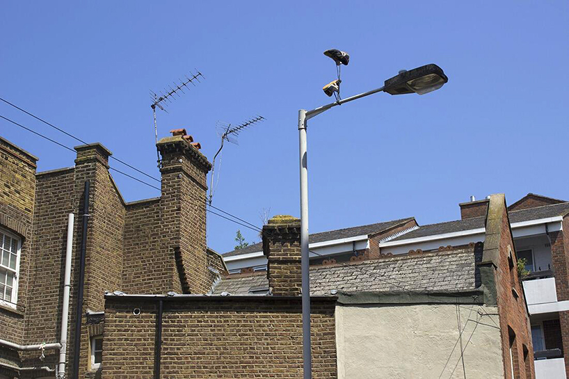 pejac-downside-up-sneakers-designboom-02