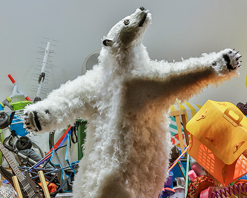 paola pivi's feathered bears frolic in the windows at la rinascente in milan
