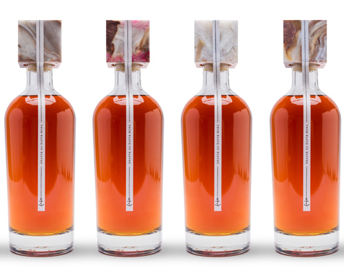 fitzroy rum recycles coca-cola labels from the north sea into premium spirit packaging