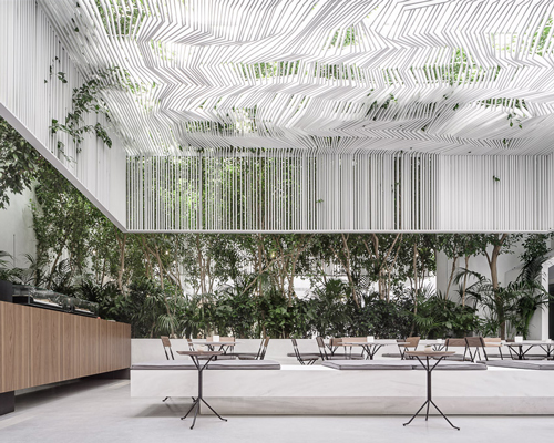 kois associated architects hang sculptural ceiling canopy over museum café in athens