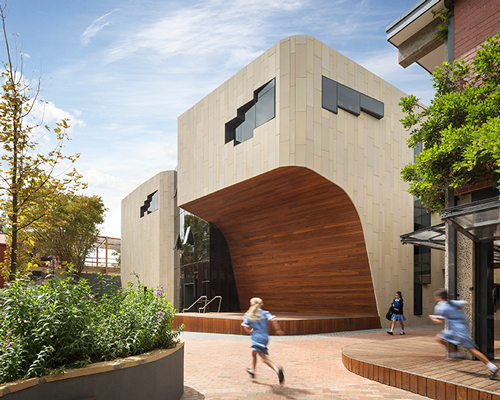 woods bagot carves section out of girls school in melbourne