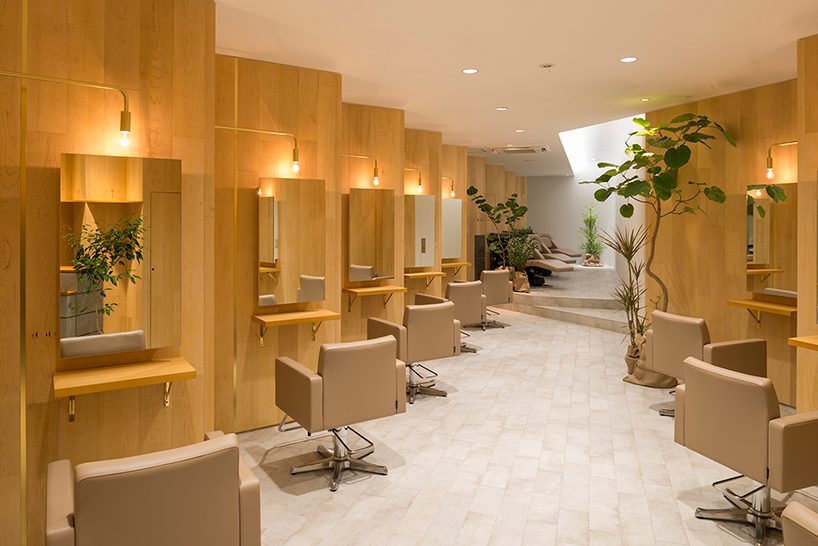 yamazaki kentaro uses rhythmic wooden walls in tokyo hair salon