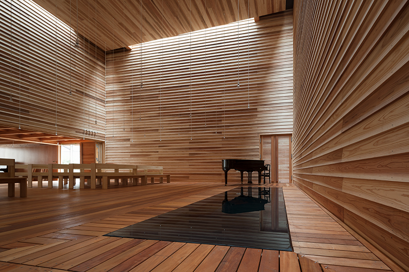 tezuka architects constructs timber church of eaves in japan
