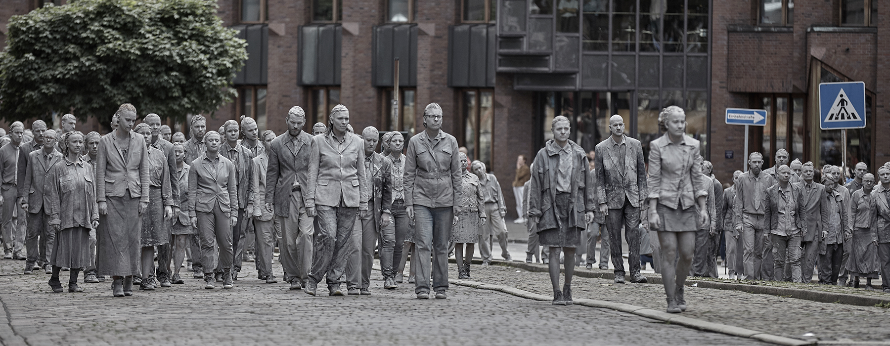 1000 ghostly figures march the streets of hamburg in protest for the G20 summit
