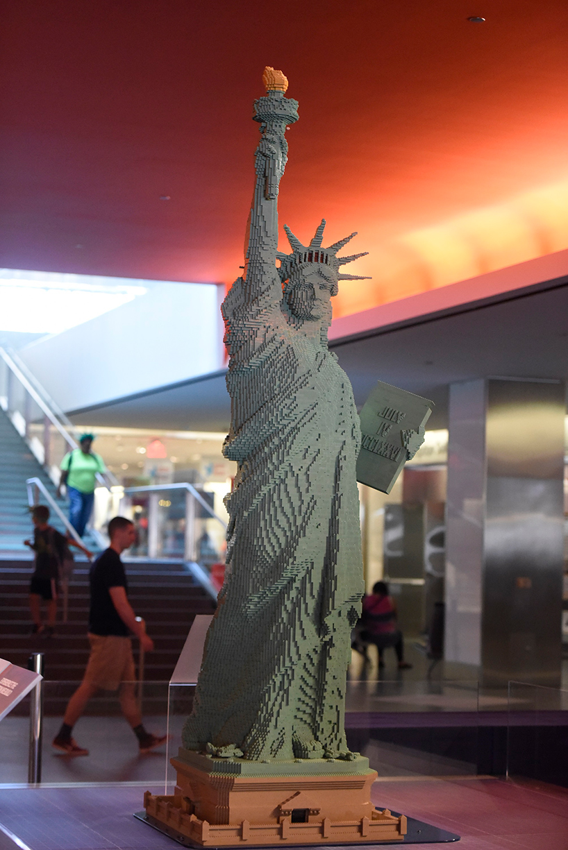 9 foot LEGO statue of liberty greets visitors into national museum of