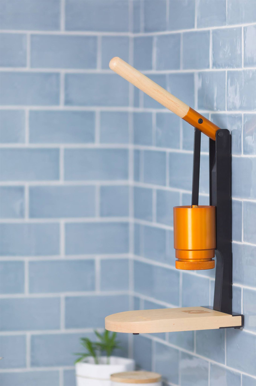 newton espresso machine crafts coffee through minimalist leverpress