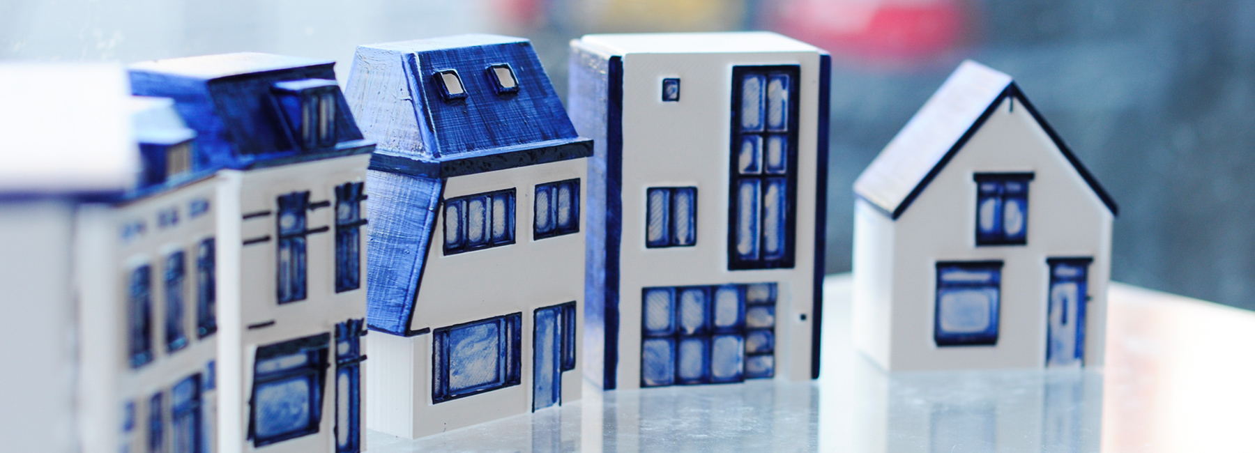 local makers hand-paint customized, miniature 3D printed delft houses