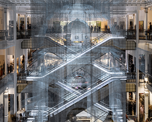 edoardo tresoldi suspends mesh and metal architectural ruins within le bon marché