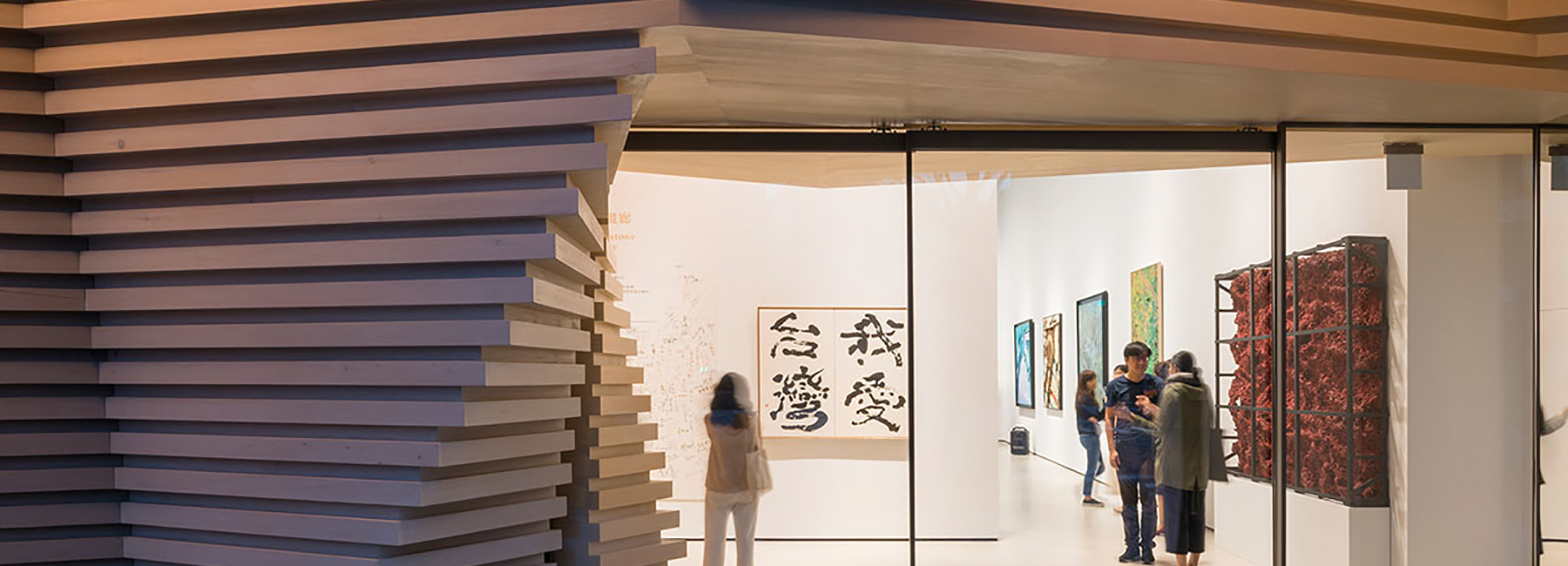 kengo kuma creates stacked wooden façade for whitestone gallery in taipei