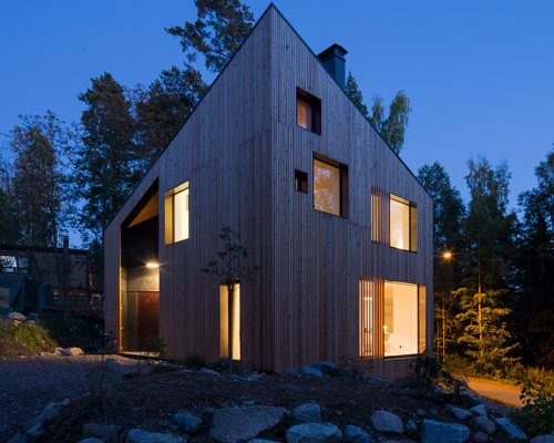 ORTRAUM architects' timber dwelling provides comfortable living space for a large family