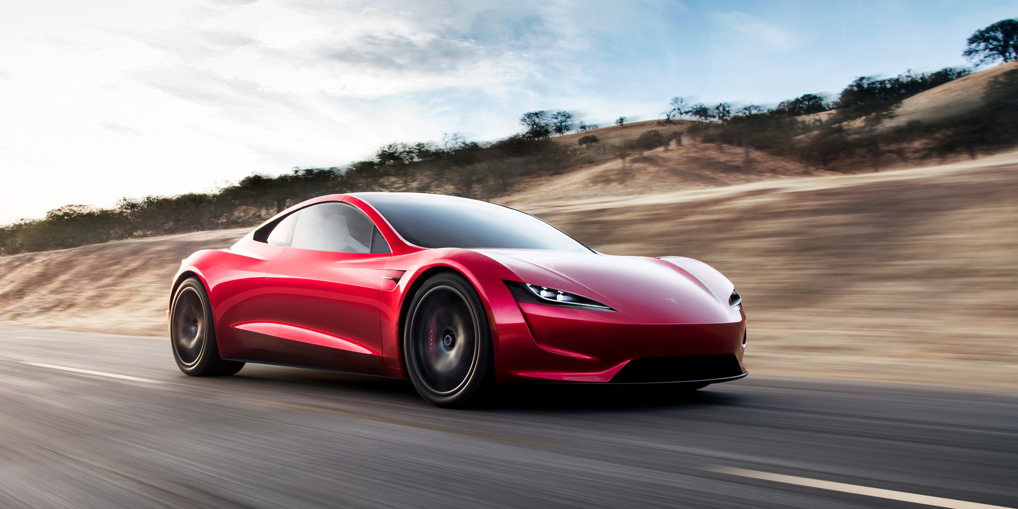 tesla roadster electric supercar races to a top speed over 250 mph