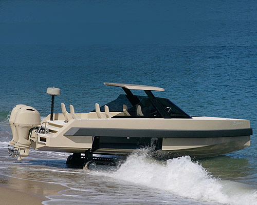 iguana's commuter amphibious yacht drives out of the sea onto the beach