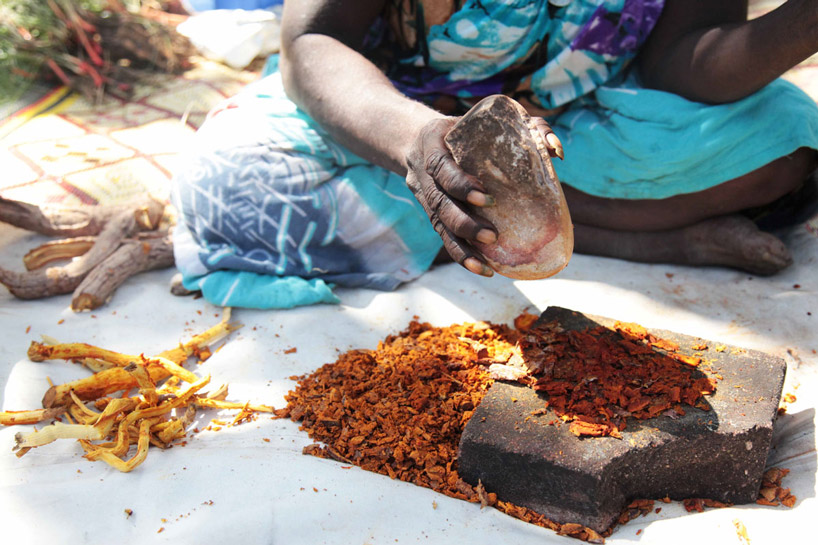 the weavers grind colour pigments from natural sources