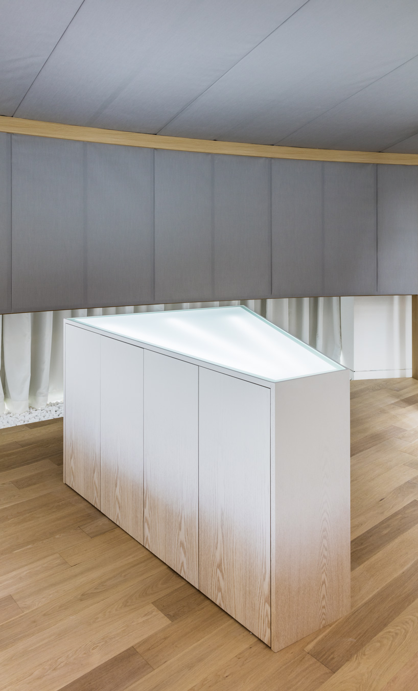 ginseng showroom by sml + the cornerz reinterprets traditional cultivating structure as retail area