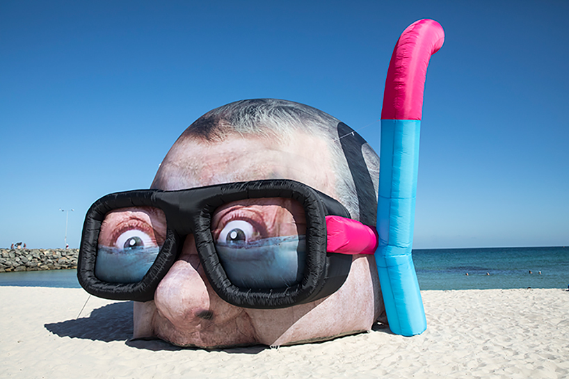 inflated damien hirst head