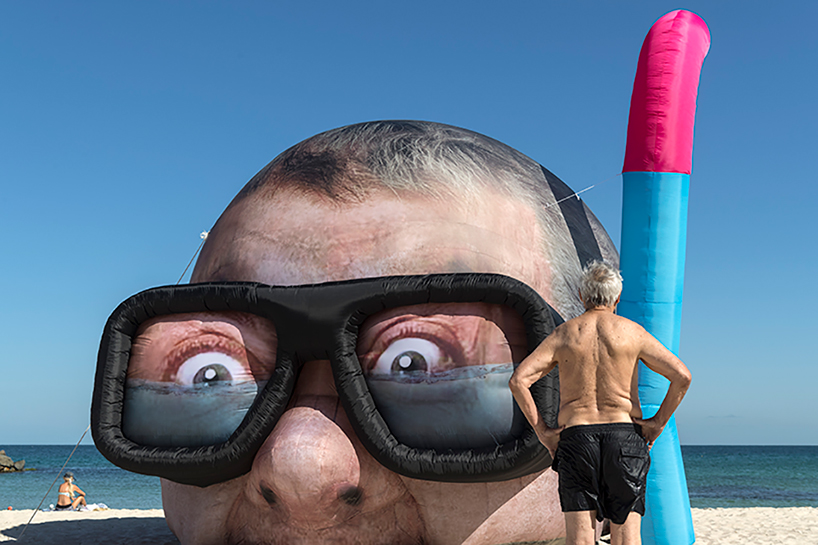 inflated damien hirst head