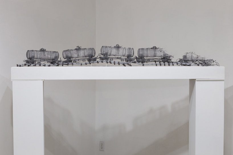 full-scale demolished car constructed from ghost-like textiles by jannick deslauriers