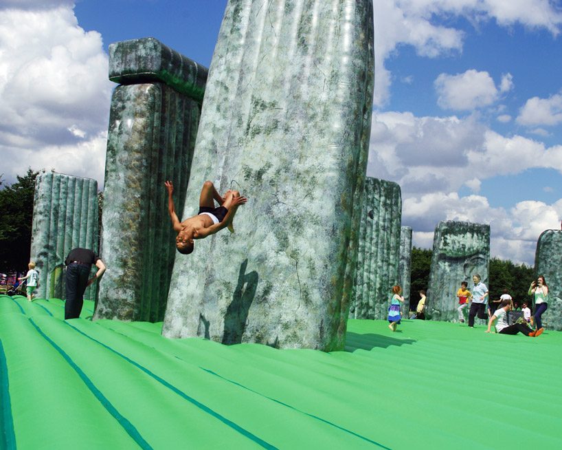 jeremy deller's inflatable stonehenge bounces its way to milan