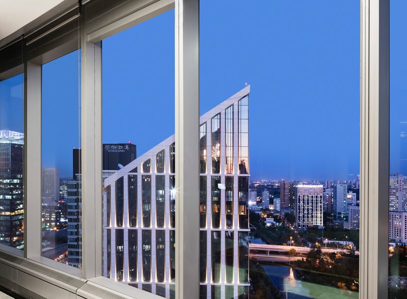 superimpose designs an exclusive wine cellar atop genesis beijing's office tower - 9
