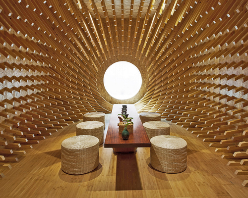 999 wooden sticks convert a rectangular room into an elliptical teahouse by minax