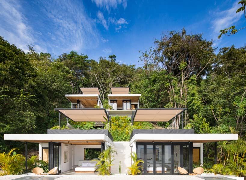 whilst the sharp lines and bright white of the buildings contrast with