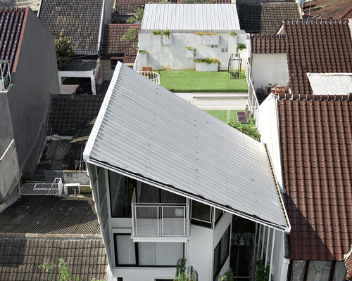 living, work and social spaces merge into a growing house in indonesia, by SA_e