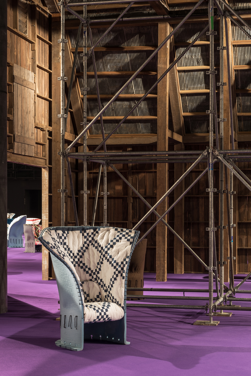 calvin klein upholsters 100 cassina feltri chairs in vintage quilts for first design miami/basel installation