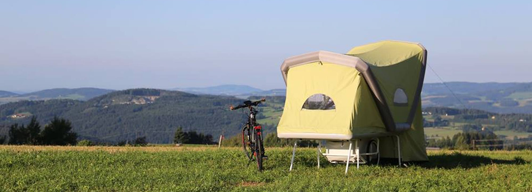 the b-turtle inflatable camper lets cyclists pitch up anywhere and everywhere
